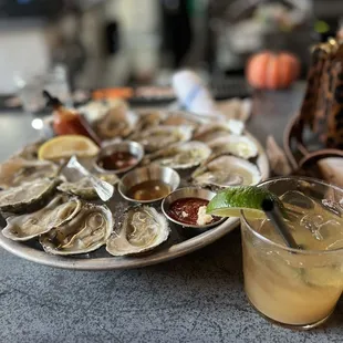 Happy hour oysters and house mule