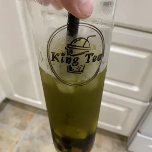 Peach-passion fruit green tea with boba