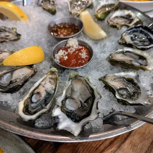 Market Oysters: Carbajal from Shelton, Washington. $28 per 1/2 dozen. Cocktail sauce, fresh horseradish, yuzu mignonette, lemon.