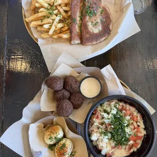 Fava beans, falafel, meat sandwiche