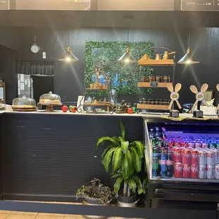 a bar with a variety of drinks