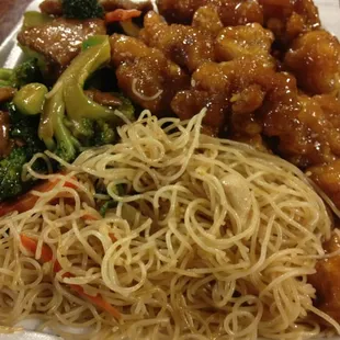 Delicious glass noodles sesame chicken and beef w broccoli