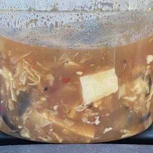 Bland, watered down, hint of mushroom tasting Hot and Sour Soup