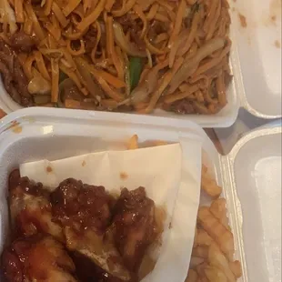 Lo mein and chicken wings.