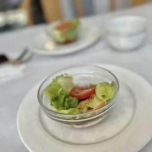 a salad in a bowl on a plate