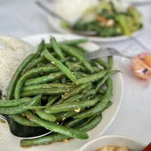 a plate of green beans and rice