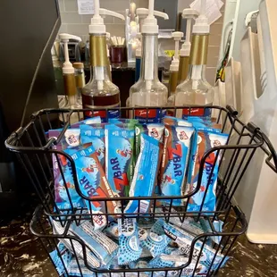 a wire basket filled with baking supplies