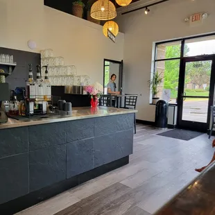 the front counter of a coffee shop