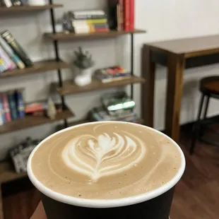 Large hot mocha.  Beautiful rosette.  Exquisite microfoam.  Espresso likely a light roast, fruity and citrus notes.