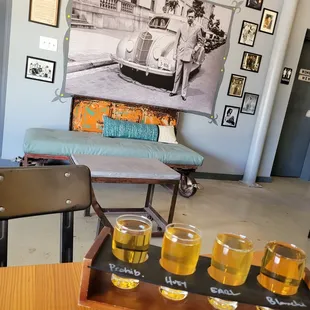 four glasses of cid on a serving tray