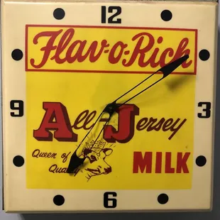 A cool older clock in the restroom.