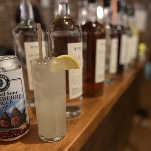 a variety of drinks on a bar