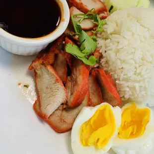 Pork BBQ w white rice and their special sauce w egg