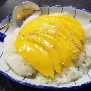 Mango and sticky rice.  Rice warm and sweet, the mango perfectly wonderful.  Such a delightful dessert.