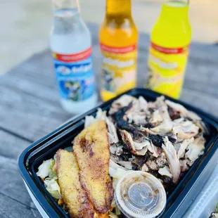 a tray of food on a picnic table