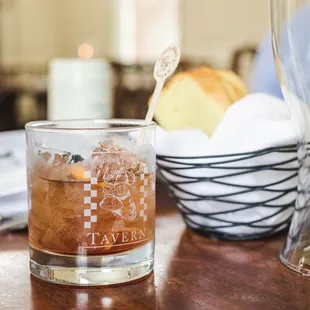 a glass of whiskey and bread
