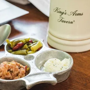 a plate of food and a mug