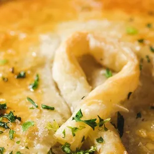 a closeup of a cheese pizza