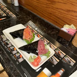 Salmon hand roll and tuna hand roll