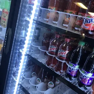 a display of sodas and drinks