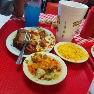 Brisket chicken Mac n cheese and loaded potatoes!