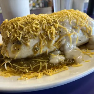 Breakfast burrito with green chile and country gravy - Added bacon &amp; Ham