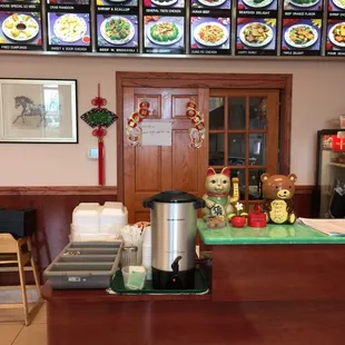 a restaurant counter and menus