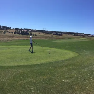 Son driving off hole 4 tee. Corse in great shape.