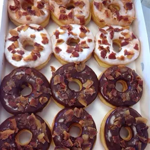 Chocolate and white icing with bacon on top