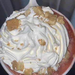 a strawberry pie with whipped cream
