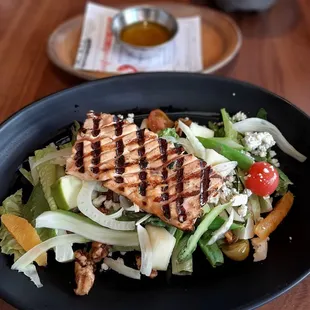 Grilled salmon on salad