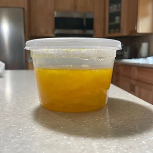 Half full container of Egg Drop Soup