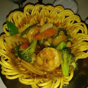 Seafood in flower basket. The basket is fried noodles