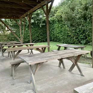 Pavilion with picnic tables where you can enjoy dinner after visiting the farmers market and food trucks (bring bug spray to sit back here)