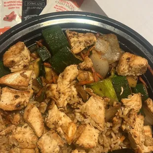 a plate of chicken and rice
