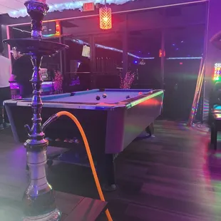 a pool table with a hookah