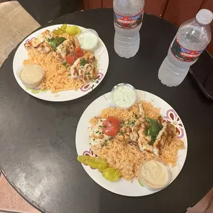 Chicken Kabob Plate, with rice, vegetables and hummus and tzatziki and 2 Arrowhead waters YUM!