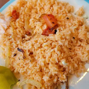 The amount of rice that's on the gyro plate. That's what I left behind