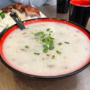 a bowl of soup and a sandwich