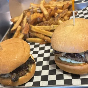 Mini burgers come as a pair, cooked medium well. But you can request cooked to your order. The hand cut French Fries were delicious.