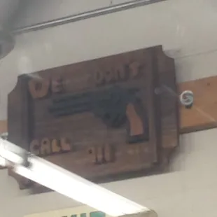 Crazy ass sign. ..."We don't call 911" betta get your act right