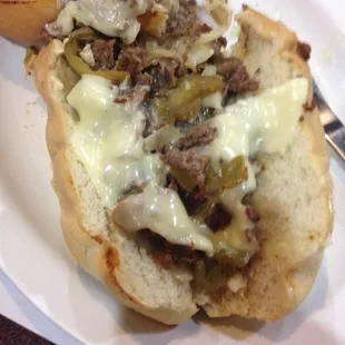 Steak &amp; Cheese... The works without lettuce and tomato.