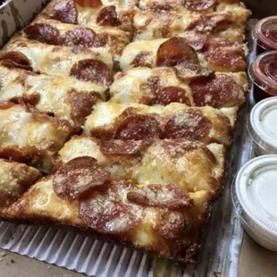 a box of pepperoni pizza