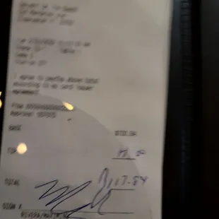 a receipt with a handwritten letter