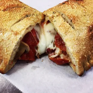 Calzone from King's Pizza. Our calzones are homemade and really big! Try it, it's delicious!