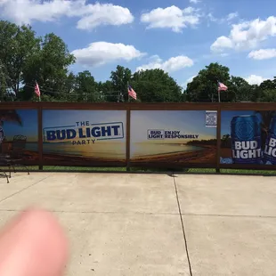 a hand holding a cup of coffee