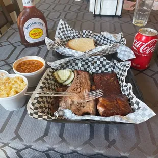 Mac and cheese, baked beans, brisket, and ribs.