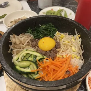 Bibimbap in a hot stone bowl - not much flavor really! 5/10