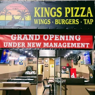 he entrance to kings pizza wings burgers tap