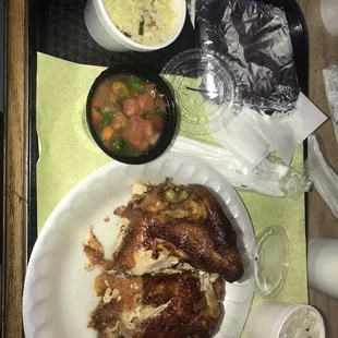 Lunch special 2pc chicken with potato salad, rice and salsa and tortillas.